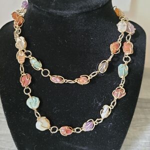 Gold tone chain with gem rocks